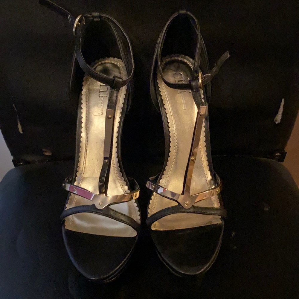Black and gold platforms